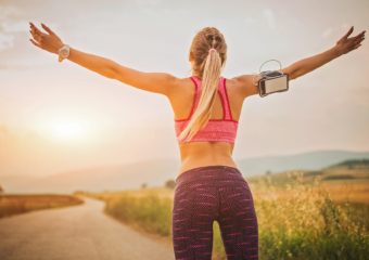 Woman running outdoors as part of an effective exercise routine for improved fitness and health."